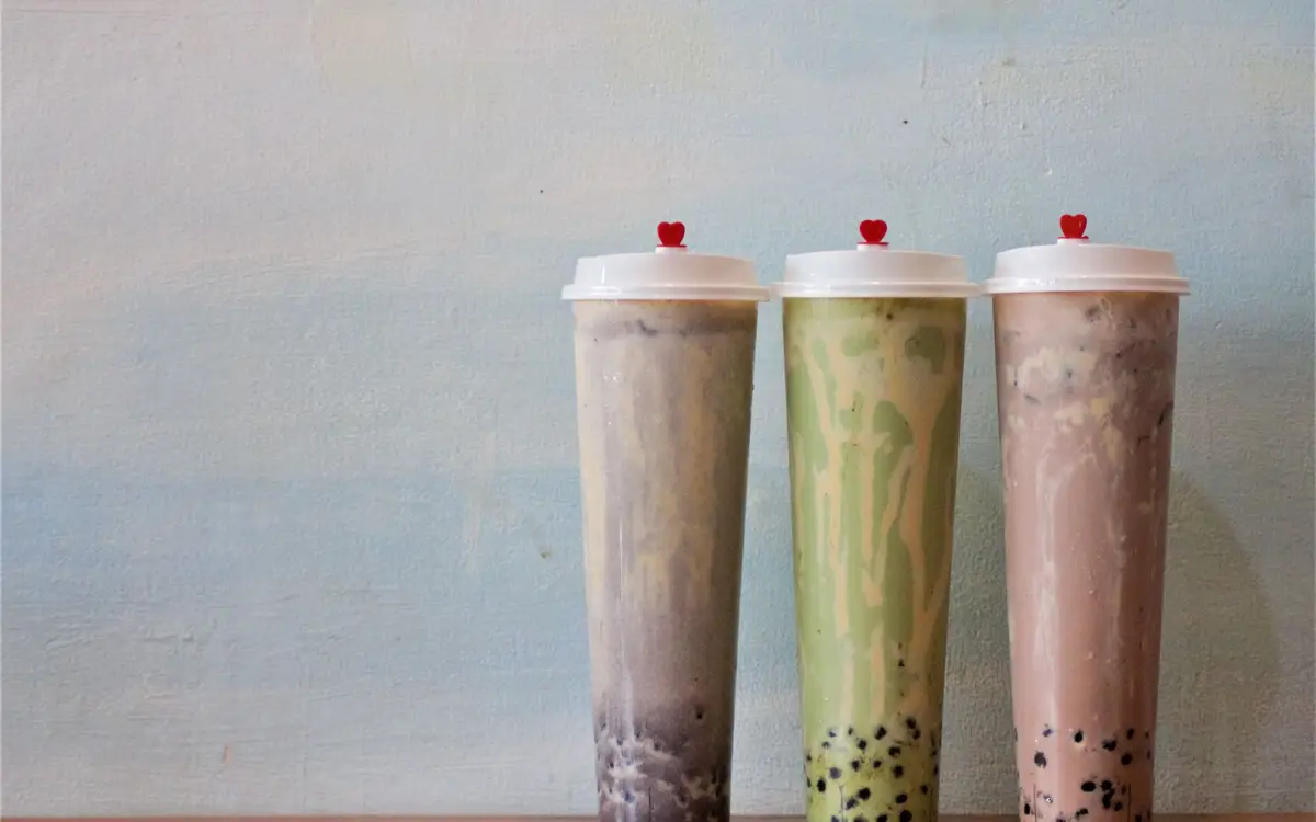 Three flavors of bubble tea in sealed cups